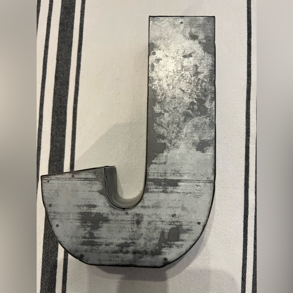 Small zinc letter “J”. Like new condition 7” x 5” x 1 1/2”
